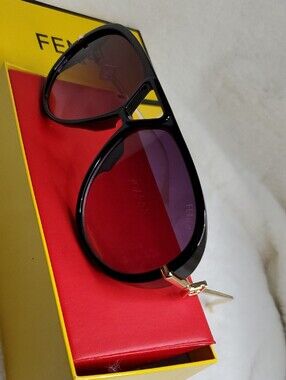 F Black and Gold Rimless Sunglasses
